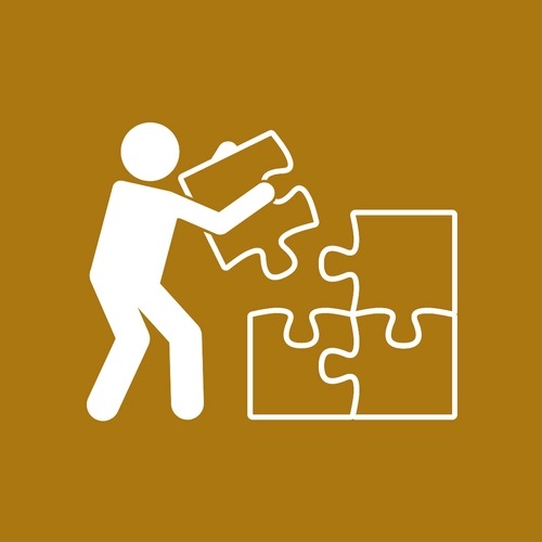 Cartoon image of a person stacking building blocks