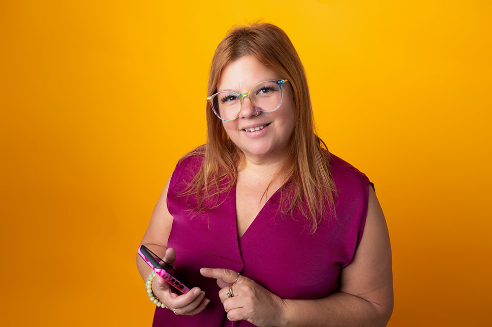 A woman holding a mobile phone