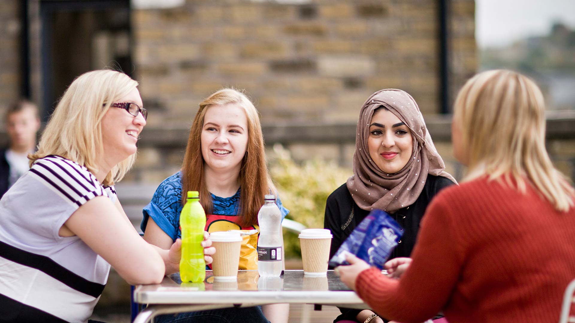 Students chatting with refreshments