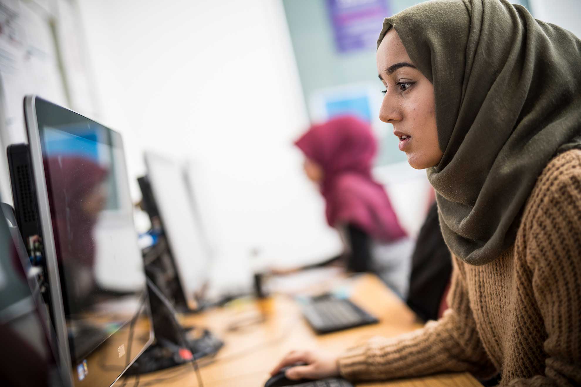 female-student-at-computer